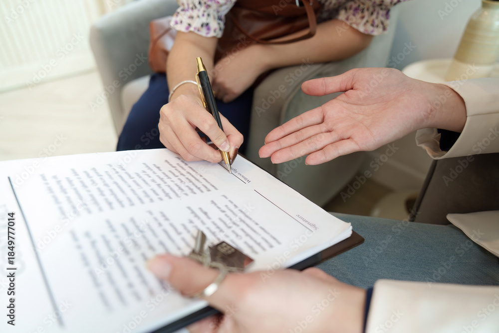 Obraz premium Real Estate Agreement. Signing contract for property purchase.