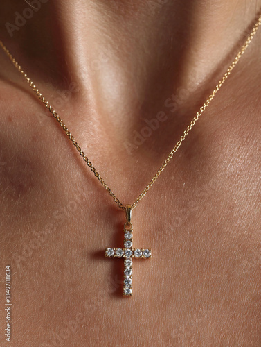 Diamond Cross Pendant Necklace on Woman’s Chest, Close-up Luxury Jewelry, Gold and Diamond Fashion Accessory