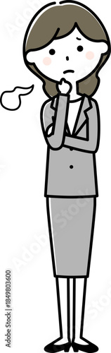 ため息をつくスーツの女性
