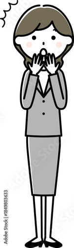 驚くスーツの女性