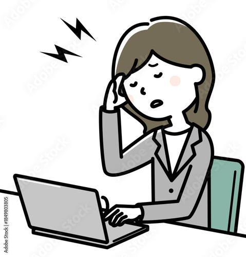 頭が痛いスーツの女性
