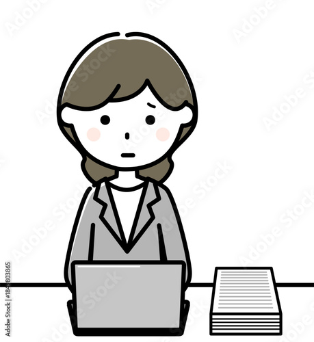 パソコンを操作するスーツの女性　キャパオーバー