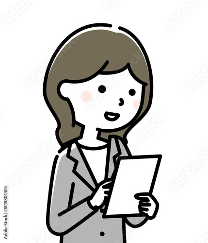 タブレットを操作するスーツの女性