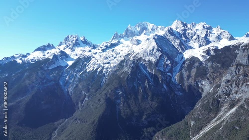 Aerial footage of the stunning scenery of Yulong Snow Mountain in Lijiang [4K60]