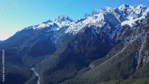 Aerial footage of the stunning scenery of Yulong Snow Mountain in Lijiang [4K60]