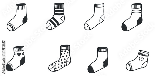 A collection of hand-drawn socks in black and white minimalist style, suitable for fashion and textile design