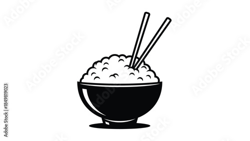 A bowl of steaming white rice with chopsticks resting on top, a simple yet satisfying meal