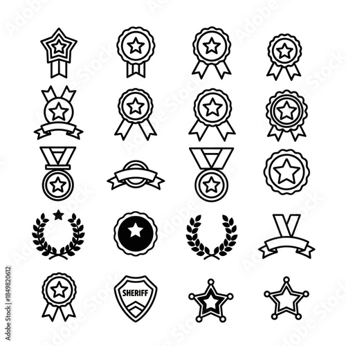 Collection of award badges and medals showcasing achievement recognition symbols