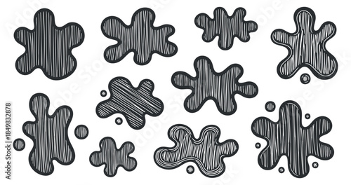 A collection of abstract ink splashes and blots in black and white line art style, suitable for creative design projects