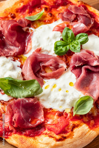 Pizza with Prosciutto Crudo, Stracciatella Cheese and Basil