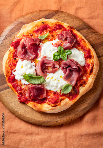 Pizza with Prosciutto Crudo, Stracciatella Cheese and Basil