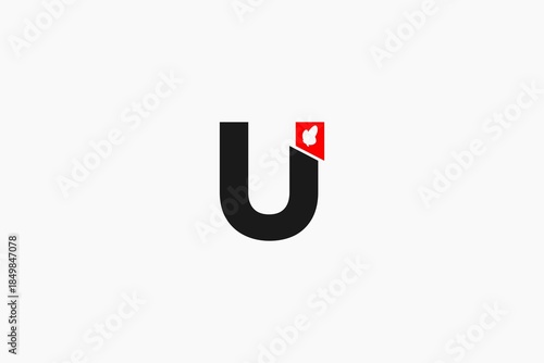 Letter U with small flame