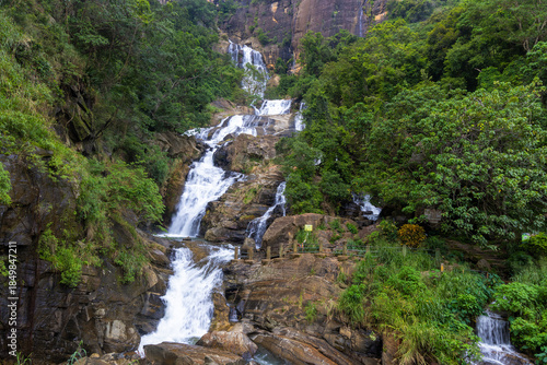 Ravana Ella Waterfall Cascading Through Lush Green Forest, Sri Lanka