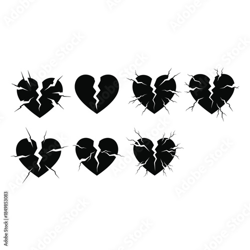 Collection of broken heart shapes in black silhouette on