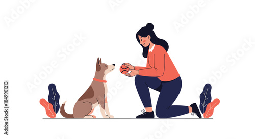 A happy young woman kneeling to play with her cute dog, holding a ball and showing love and friendship between a pet and its owner.