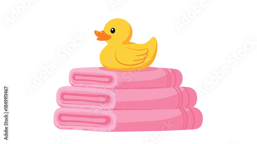 Cheerful yellow rubber duck rests comfortably atop a neatly folded stack of soft pink towels, creating a playful bathroom scene.