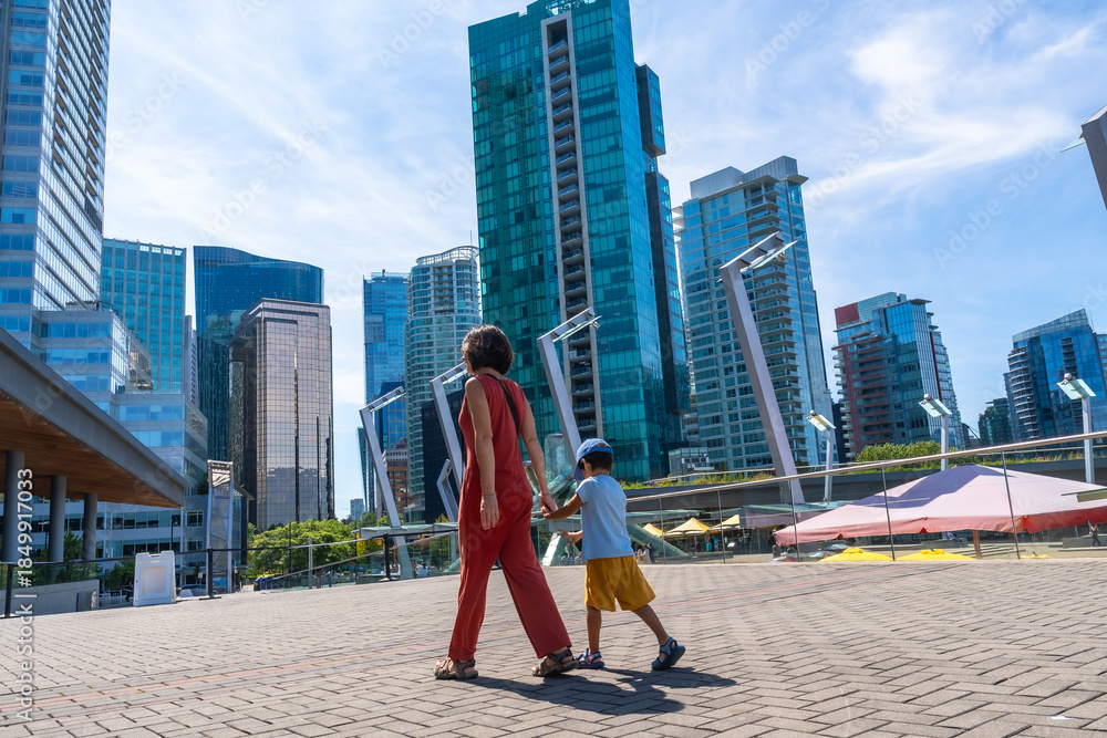 Fototapeta premium Mother and son walking in downtown vancouver, british columbia