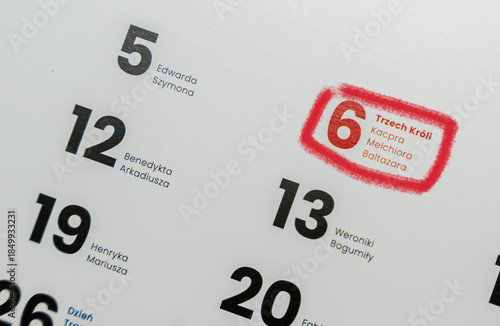 Photos A close-up of a calendar page highlighting January 6 with a red circle around Three Kings Day