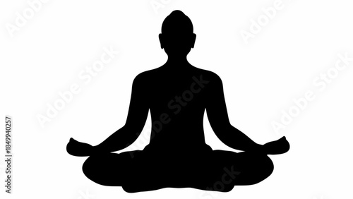 Serene silhouette of a person meditating in lotus position