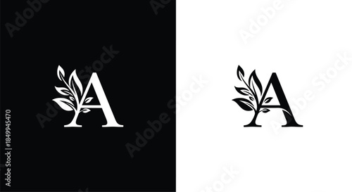 Decorative initial letter A decorated with a delicate leaf vine shown in both positive and negative versions for branding.