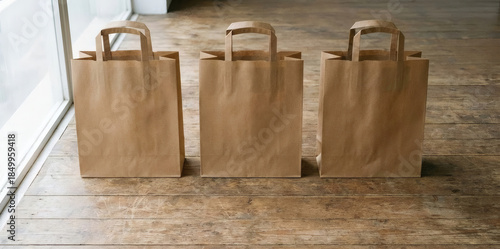 Row of three blank brown kraft paper shopping bags mockup standing on wooden floor. Sustainable retail packaging template with copy space. AI GENERATED