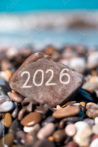 The year 2026 etched on a rock by the ocean