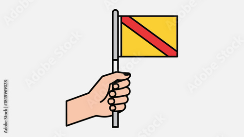 Hand Holding Yellow Football Soccer Linesman Referee Flag on Gray Background