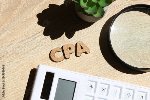 Tableau sur toile Word CPA up on the table with office accessories