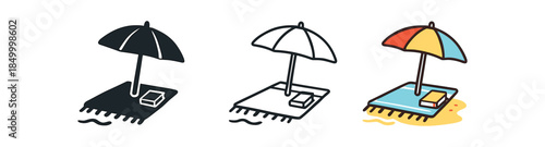 minimal travel beach umbrella with towel and book