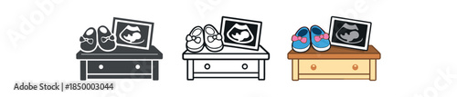 family life baby shoes and ultrasound photo on dresser