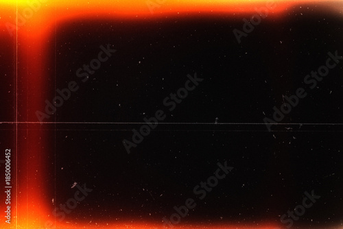 light leak overlay effect with scratch dust and motion blur orange light leaks,retro noisy film texture light leak flare on black background,abstract background with ray,grunge film strip background