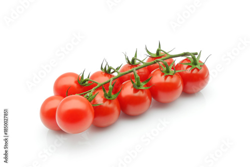 Cherry tomato branch isolated on white background. Red fresh tomatoes close-up.	
