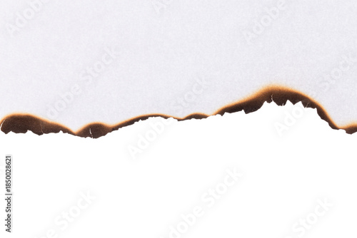 White paper with burnt edge detail and dark scorch marks