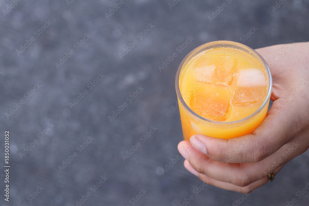 custom made wallpaper toronto digitalSoft drinks orange juice and iced in glass on hand