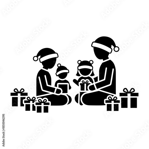 Silhouette of Family Opening Gifts on Christmas Eve