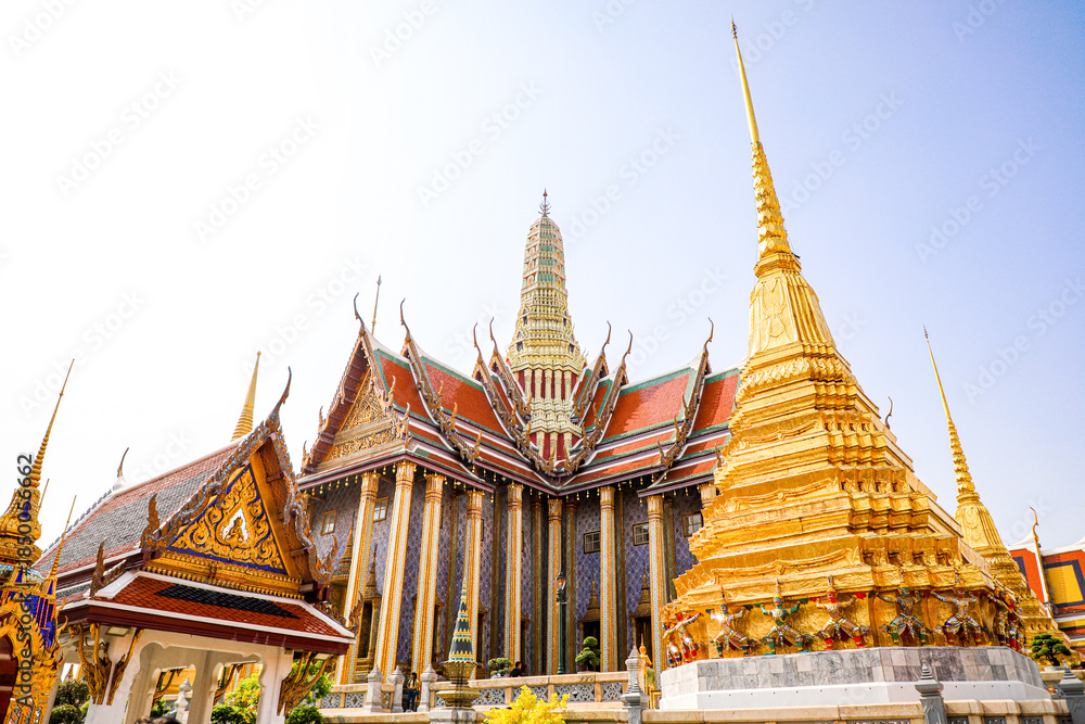 Fototapeta premium Wat Phra Kaew or Wat Phra Sri Rattana Satsadaram is temple used for various royal ceremonies during reign of King Rama I. It is temple within the Grand Palace. Inside temple is the Emerald Buddha.