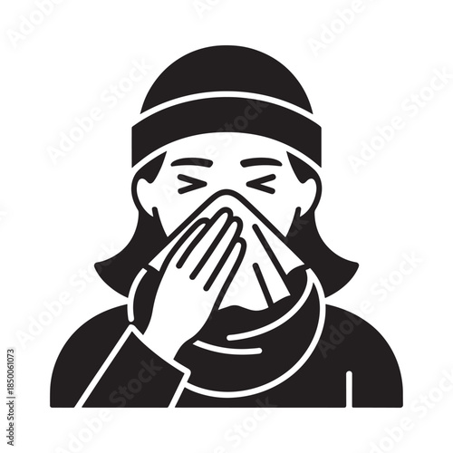 Sick person covering mouth with tissue possibly experiencing cold or flu symptoms