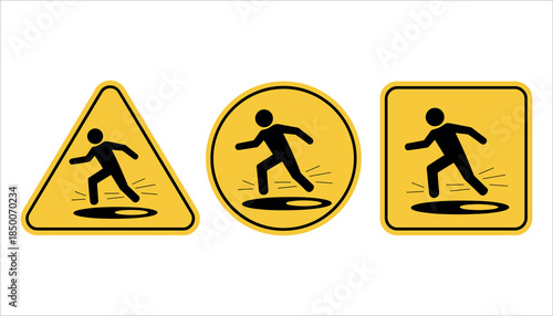 Yellow warning signs depicting a black silhouette of a person slipping on a wet surface caution sign