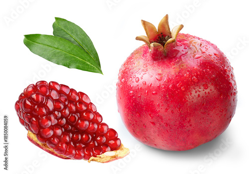 Pomegranate  slice and leaves isolated white background