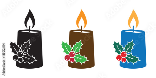 Holiday candles with holly decorations