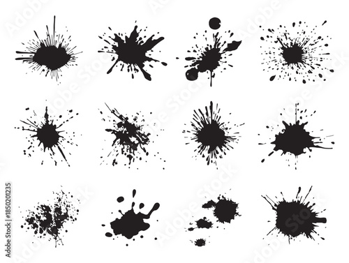 Collection of abstract black ink splatters and blots on a clean white background artistic texture