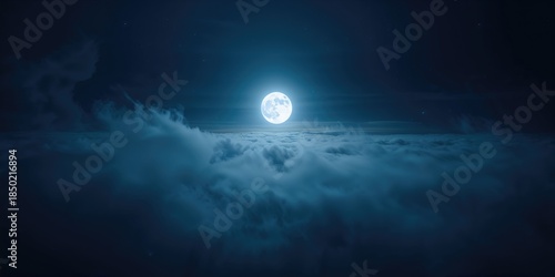 Night sky with full moon and cloud cover, natural light source for landscape setting, World Night Sky Awareness