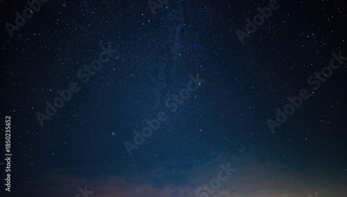 Clear night sky illuminated by stars, serving as a background for layout and design elements