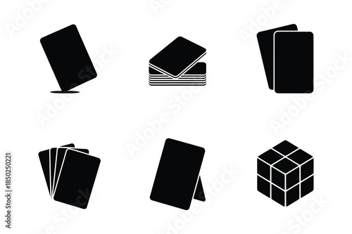 Set of black playing card icons and cube silhouette on white background