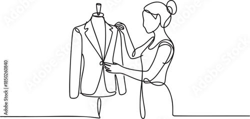 Continuous line drawing of a fashion designer working on a suit jacket, showcasing creativity and professional craftsmanship