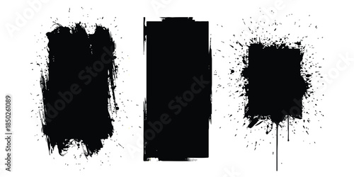 Three different black grunge brush stroke and ink splatter elements set
