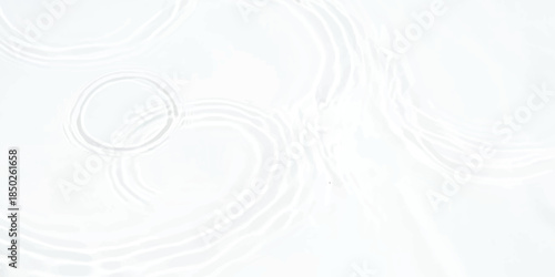 Abstract background of gentle water ripples creating concentric circles on a bright white surface