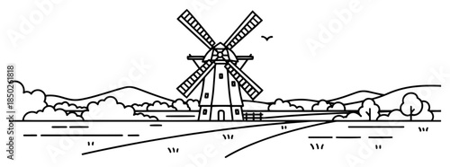 Traditional windmill standing in a rural countryside landscape