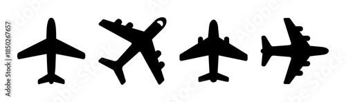 Silhouette illustration of four airplanes viewed from above in a row on a white background