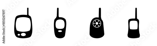 A simple black and white illustration of four stylized vintage mobile phones with antennas shown